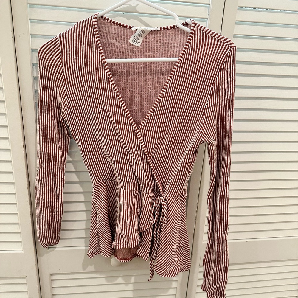 Burgundy and white striped long sleeve wrap V-neck top